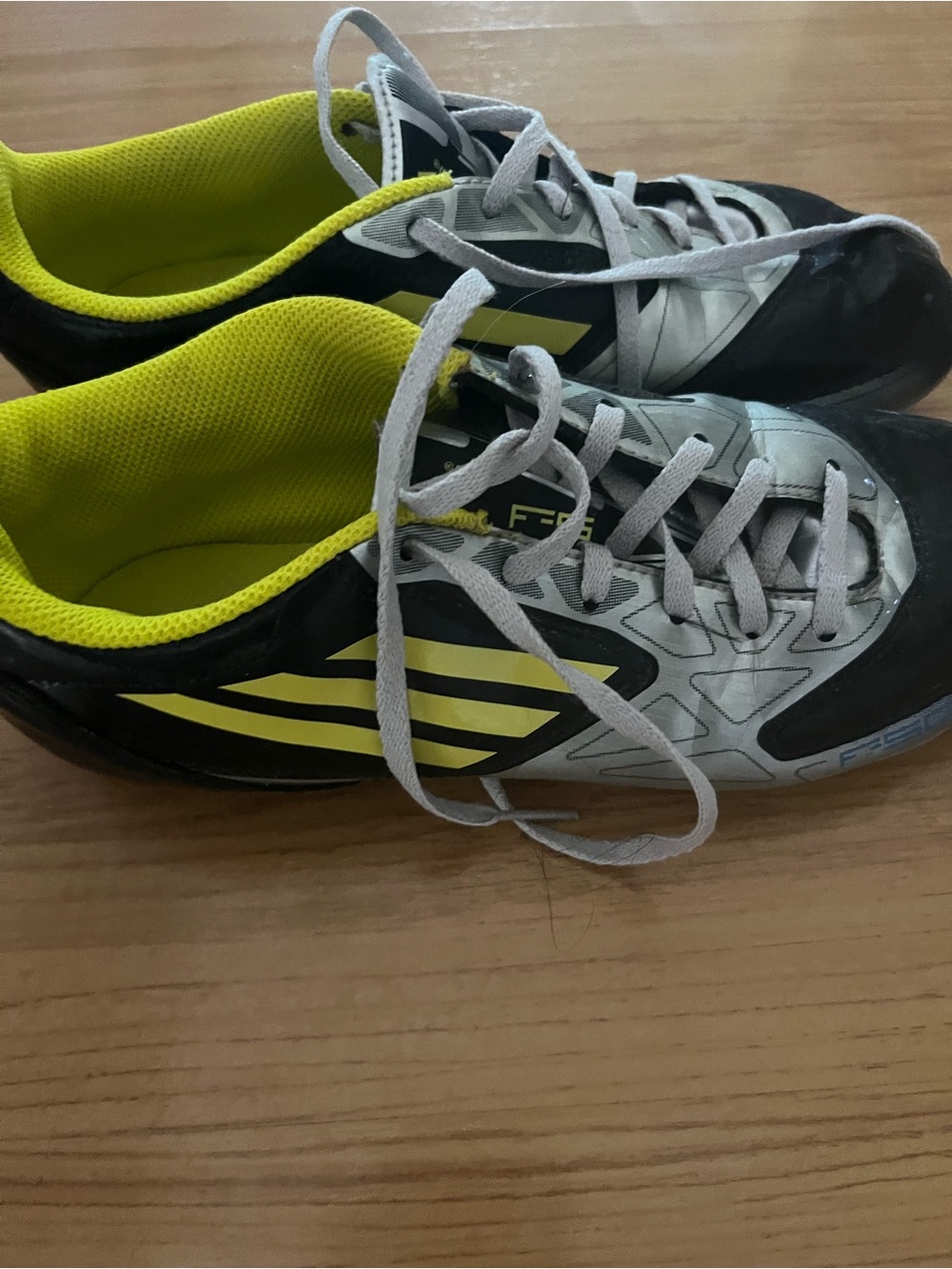 adidas Women/ Girls black and yellow soccer cleats